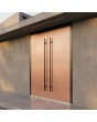 Aluminum double door with copper texture of milled metal