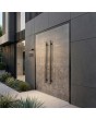 Black aluminium double front door covered with sintered quartz